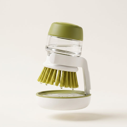Cepillo dispensador de jabón shoapy en verde fresco, con gotas de agua